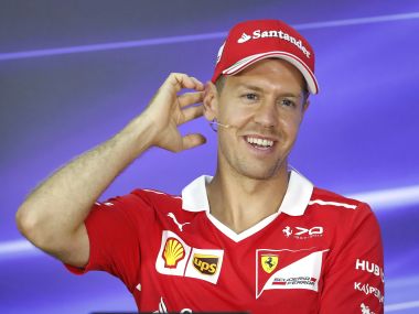 Malaysian Grand Prix: Sebastian Vettel smiles through pain of another setback to championship challenge Malaysian Grand Prix: Sebastian Vettel smiles through pain of another setback to championship challenge