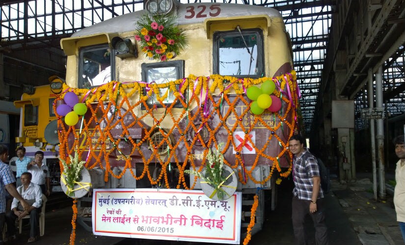 Railfans pose for photograph while decorating the last DC EMU. After Central Railways decided to switch traction from Direct Current (DC) to Alternate Current (AC) railfans got the opportunity to decorate the last DC EMU. Photo credit: Vijay Arvadhuman