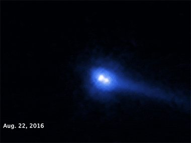NASA's Hubble Space Telescope finds binary pair of asteroids with a comet like tail NASA's Hubble Space Telescope finds binary pair of asteroids with a comet like tail