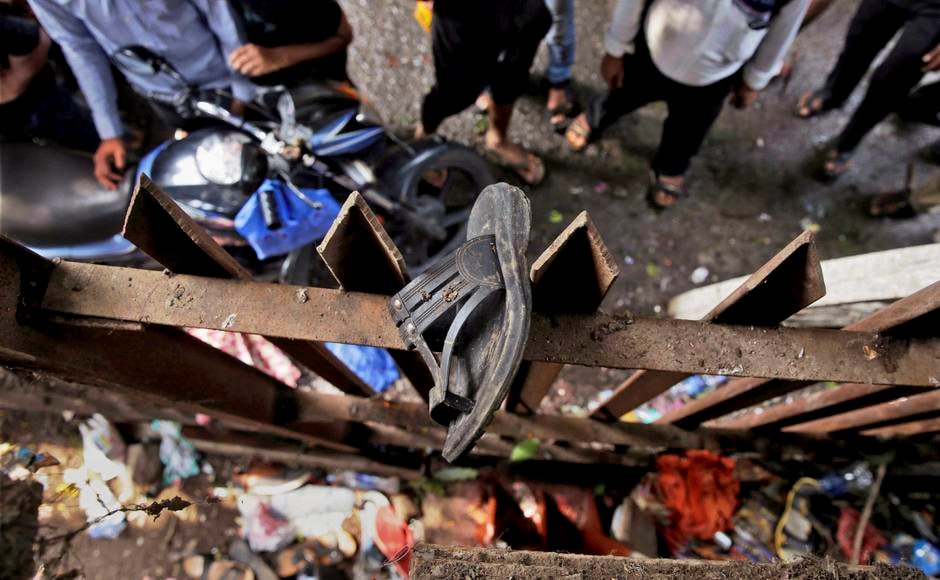 The tragedy took place around 10:40 am when the foot over-bridge was heavily crowded and rumours of short-circuit and bridge collapse led to panic among the commuters. PTI The tragedy took place around 10:40 am when the foot over-bridge was heavily crowded and rumours of short-circuit and bridge collapse led to panic among the commuters. PTI