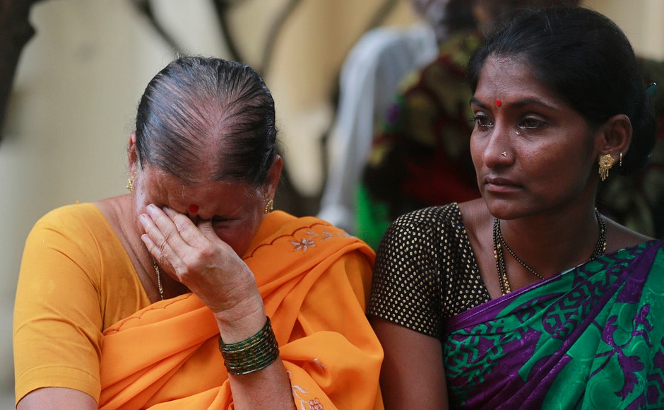 By late afternoon, as the death toll climbed, relatives of the deceased mourned the loss of their family members outside KEM hospital. AP By late afternoon, as the death toll climbed, relatives of the deceased mourned the loss of their family members outside KEM hospital. AP