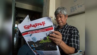 Myanmar cartoonists taking aim at Rohingya Muslims spread rapidly across country's social media