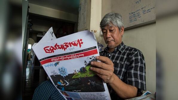 Myanmar cartoonists taking aim at Rohingya Muslims spread rapidly across country's social media