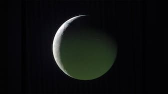 NASA releases image of a brightly lit crescent on Enceladus captured by the Cassini mission to Saturn