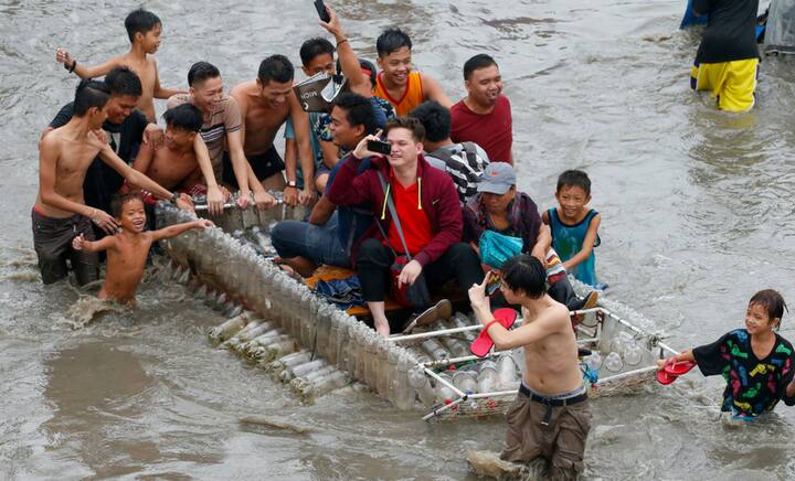 Manila, Quezon battle flood fury as tropical depression Maring pounds Philippines