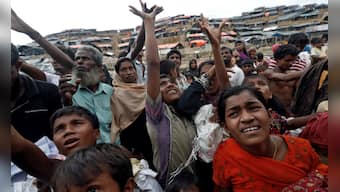 Rohingya Muslims flee to Bangladesh, recount horrors; allege civilians collaborating with Myanmar Army