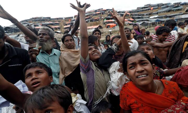 Rohingya Muslims flee to Bangladesh, recount horrors; allege civilians collaborating with Myanmar Army Rohingya Muslims flee to Bangladesh, recount horrors; allege civilians collaborating with Myanmar Army