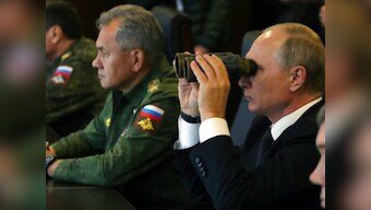 Vladimir Putin watches war games with Belarus as wary NATO eyes Russia