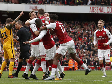 Premier League: Clinical Arsenal beat Brighton to mark a happy 21st anniversary for Arsene Wenger Premier League: Clinical Arsenal beat Brighton to mark a happy 21st anniversary for Arsene Wenger