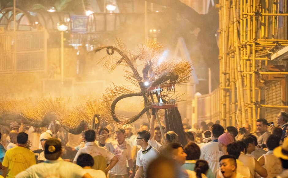 Among the most splendid of all festive activities, is the Tai Hang Fire Dragon Dance with over 70,000 sticks of burning incense in which around 300 people participate in a dance. AP Among the most splendid of all festive activities, is the Tai Hang Fire Dragon Dance with over 70,000 sticks of burning incense in which around 300 people participate in a dance. AP