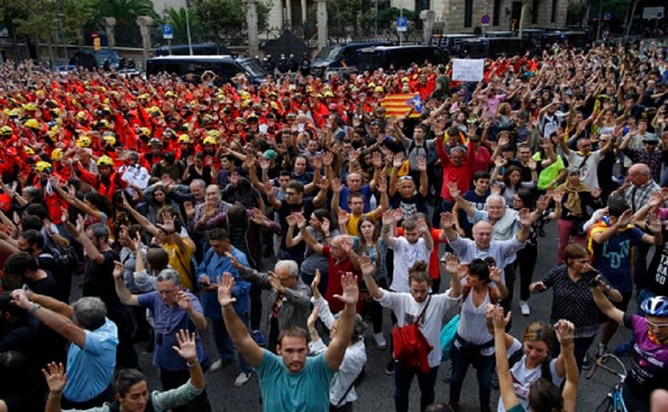 Businesses, offices and transport services across Catalonia shut down on Tuesday, as part of a one-day protest against the violent intervention of Spanish police forces in Sunday’s independence referendum. Protesters occupied several Catalan motorways as well as key avenues inside the city, halting traffic across many parts of the region. AP Businesses, offices and transport services across Catalonia shut down on Tuesday, as part of a one-day protest against the violent intervention of Spanish police forces in Sunday’s independence referendum. Protesters occupied several Catalan motorways as well as key avenues inside the city, halting traffic across many parts of the region. AP