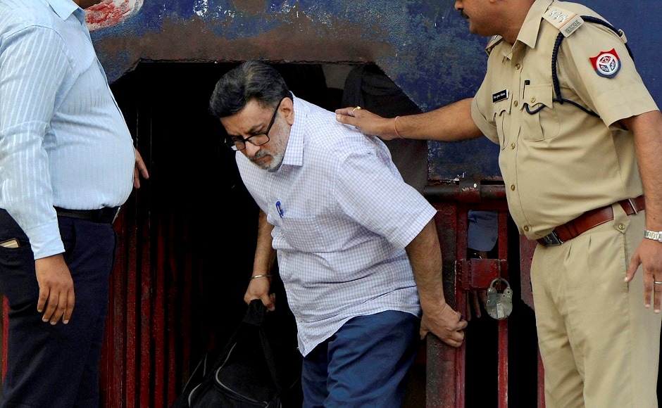 Rajesh wore a white shirt and a pair of blue trousers, while his wife was dressed in an orange kurta, with a white salwar and dupatta. They both carried bags. PTI Rajesh wore a white shirt and a pair of blue trousers, while his wife was dressed in an orange kurta, with a white salwar and dupatta. They both carried bags. PTI