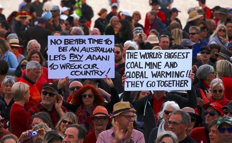 More than 1,000 people formed a human chain shouting 'Stop Adani', on the sands of Sydney's Bondi Beach. Reuters More than 1,000 people formed a human chain shouting 'Stop Adani', on the sands of Sydney's Bondi Beach. Reuters