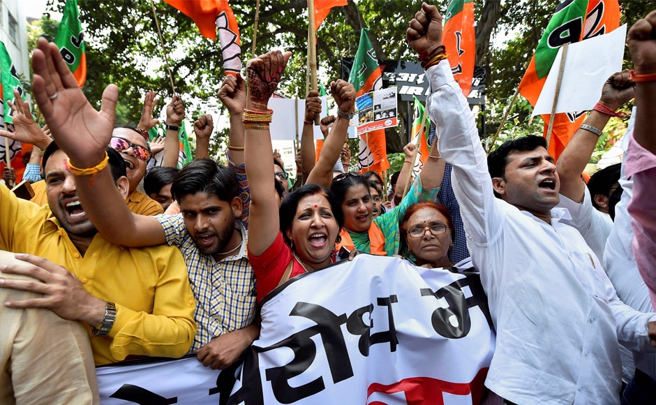 BJP workers march to CPM office in New Delhi to protest political ...