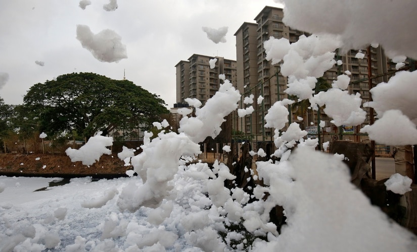 Toxic froth from the polluted Bellandur Lake is blown into the air by wind in Bengaluru, India, Image: Reuters