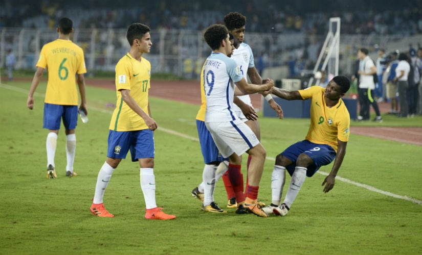 England players console the Brazilians after beating the South American giants in the semi-finals. Getty Images