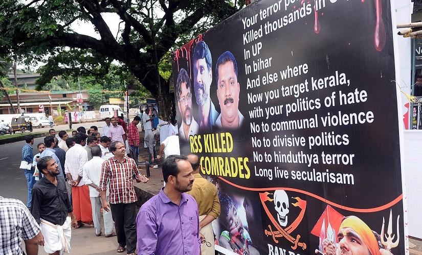 A poster at CPM rally in Kannur blames BJP-RSS for violence in Kerala. SK Mohan/Firstpost