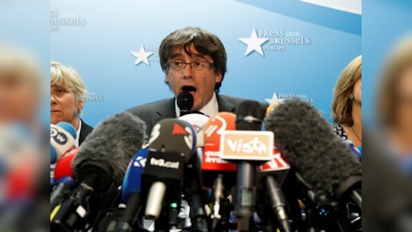 In Belgium for 'safety', axed Catalan leader Carles Puigdemont summoned by Spain's top criminal court