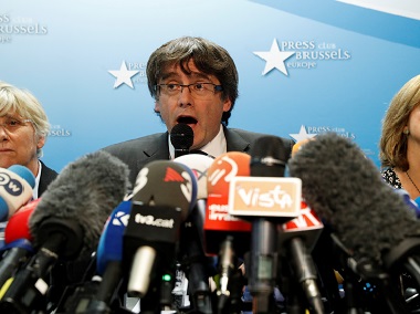 In Belgium for 'safety', axed Catalan leader Carles Puigdemont summoned by Spain's top criminal court In Belgium for 'safety', axed Catalan leader Carles Puigdemont summoned by Spain's top criminal court