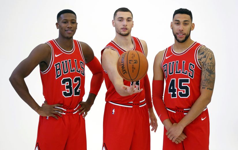 Going by their offseason, the Chicago Bulls seem to be in a self-destruct mode. Kris Dunn, left, Zach LaVine, center, and Denzel Valentine pictured posing for a portrait during media day. AP