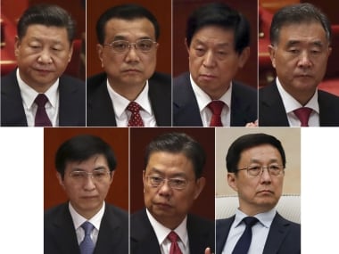 President Xi Jinping (top left) with the new members of the Politburo Standing Committee. AP