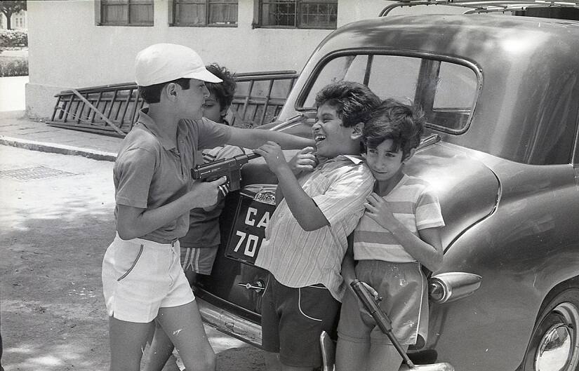 Gun battle at Cusrow Baug, Bombay 1985. Image by Sooni Taraporevala