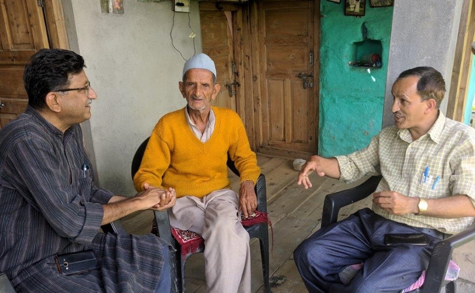 Dhyan Singh Rawat with Molda village patriarch. Image credit: S Giridhar