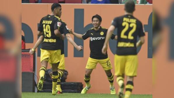 Bundesliga: Borussia Dortmund go clear with win at Augsburg despite Pierre-Emerick Aubameyang's penalty howler