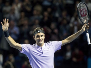 Roger Federer celebrates after winning the semi-final against David Goffin at Swiss Indoors. AP