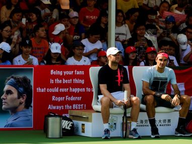 Roger Federer's fans hold up a poster during a practice session at Shanghai. Image courtesy: Twitter @RogerFederer