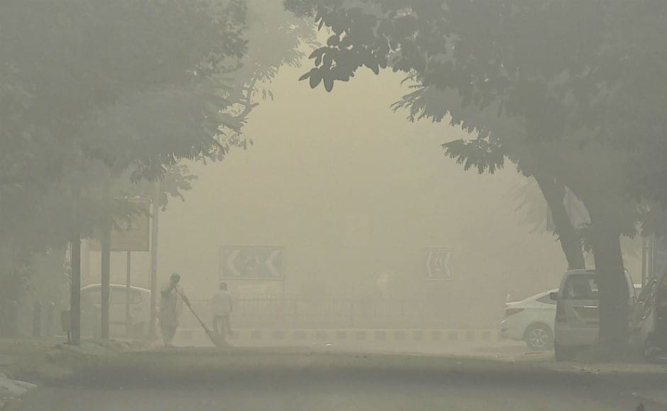 The city's air witnessed a rise in the air pollutant level with Average Air Quality Index (AQI) being 411 at 9 am on Tuesday morning. Visiblity dropped to 200 meters, resulting in slow traffic. PTI The city's air witnessed a rise in the air pollutant level with Average Air Quality Index (AQI) being 411 at 9 am on Tuesday morning. Visiblity dropped to 200 meters, resulting in slow traffic. PTI