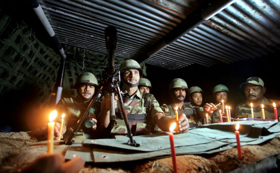 The festival was celebrated with fervour by army personnel posted near International border. Bordermen lit up diyas and brust crackers, however the traditional practice of exchanging sweets with Pakistani troops did not take place. PTI The festival was celebrated with fervour by army personnel posted near International border. Bordermen lit up diyas and brust crackers, however the traditional practice of exchanging sweets with Pakistani troops did not take place. PTI