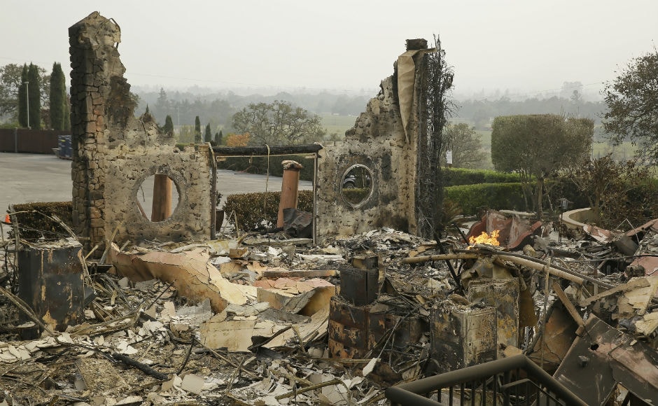 The flames from 17 major blazes have blackened more than 1,15,000 acres (46,500 hectares) since fires broke out on Sunday amid hot, dry conditions and high winds. Reuters The flames from 17 major blazes have blackened more than 1,15,000 acres (46,500 hectares) since fires broke out on Sunday amid hot, dry conditions and high winds. Reuters