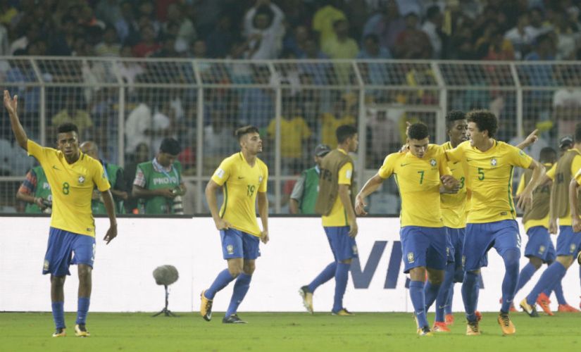 Brazil players celebrate a goal against Germany. AP