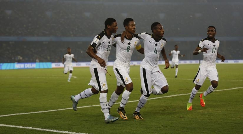 Ghana's Eric Ayiah, center, and teammates a goal during the FIFA U-17 World Cup. AP