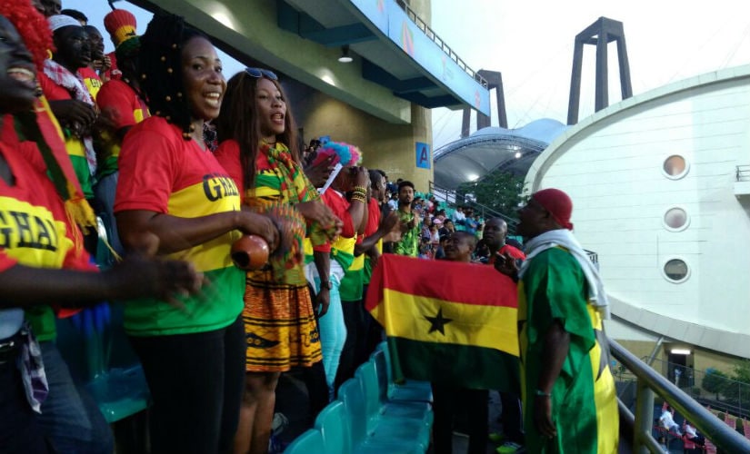 Members of Ghana Supporters Association sing and dance during Ghana's match against Niger. Shivam Damohe