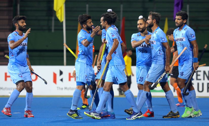 India players congratulate Akashdeep Singh (hidden) after he scored their opening goal. Image courtesy: Neeraj Tiwari