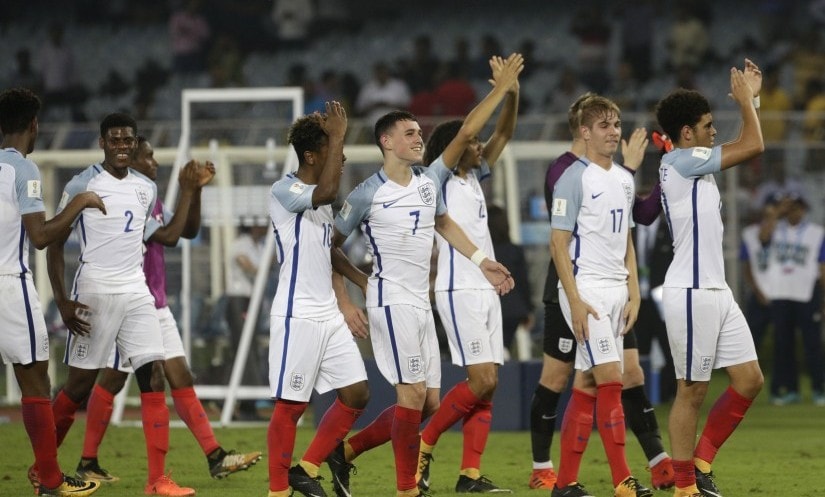 England players celebrate their victory over Brazil in the FIFA U-17 World Cup semi-final. AP