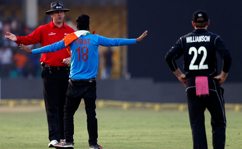 Virat Kohli fan ran onto the ground and towards Kohli after the Indian captain completed his 32nd ton. AP Virat Kohli fan ran onto the ground and towards Kohli after the Indian captain completed his 32nd ton. AP