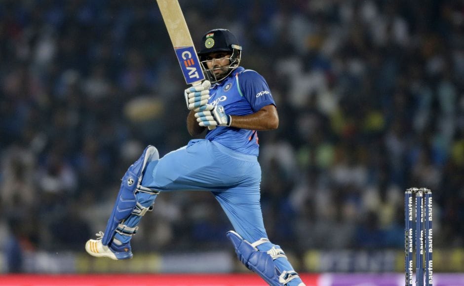 On a slow, tough wicket, the duo put on 50 off 69 balls and then crossed the 100 mark off 113 balls. Rohit Sharma reached his half-century off 52 balls. AP On a slow, tough wicket, the duo put on 50 off 69 balls and then crossed the 100 mark off 113 balls. Rohit Sharma reached his half-century off 52 balls. AP