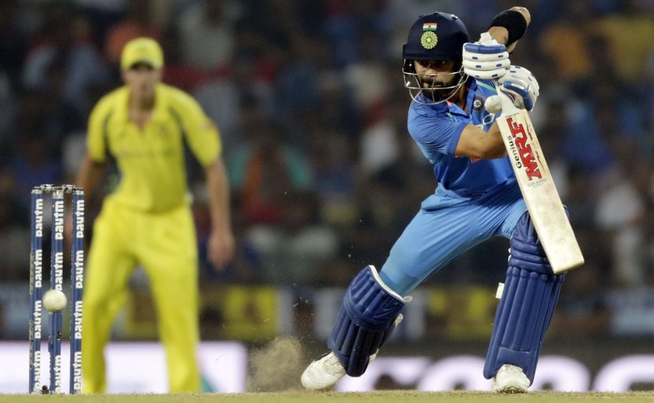 Virat Kohli (39) then joined Sharma in the middle and put on 99 runs for the second wicket. They helped India cross 200 in the 37th over, making batting look easy on a pitch where Australian batsmen struggled to get going. AP Virat Kohli (39) then joined Sharma in the middle and put on 99 runs for the second wicket. They helped India cross 200 in the 37th over, making batting look easy on a pitch where Australian batsmen struggled to get going. AP