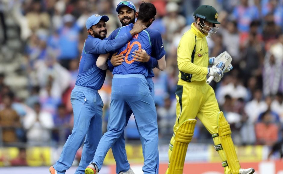 After Warner holed out to long on off Axar Patel, two overs later, the visitors were in serious trouble when Patel also snapped up Peter Handscomb (R) who was out sweeping with Ajinkya Rahane running back from slip to complete the catch. AP After Warner holed out to long on off Axar Patel, two overs later, the visitors were in serious trouble when Patel also snapped up Peter Handscomb (R) who was out sweeping with Ajinkya Rahane running back from slip to complete the catch. AP