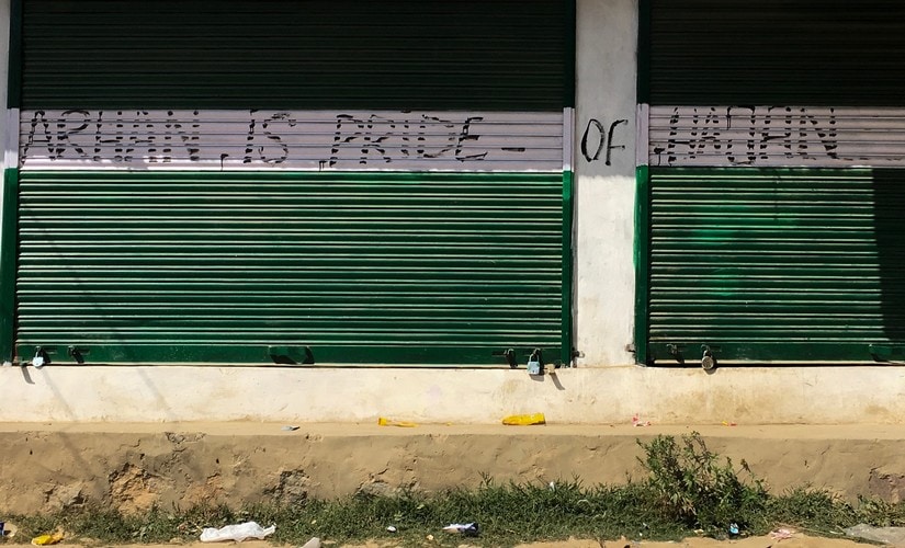 Posters glorifying Arahan, the first militant to emerge from Hajin, Kashmir. Image courtesy: Sameer Yasir.