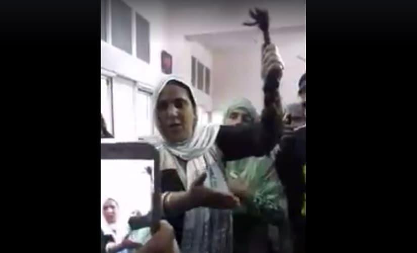 A video on Facebook shows a woman showing her chopped braid. Image courtesy: Facebook