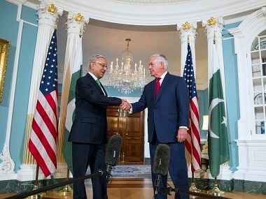 Secretary of State Rex Tillerson shakes hands with Pakistan foreign minister Khawaja Asif. AP