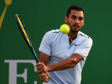 Nick Kyrgios of Australia hits a return during the men's singles against Steve Johnson of America at the Shanghai Masters tennis tournament in Shanghai on October 10, 2017. / AFP PHOTO / CHANDAN KHANNA