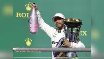 United States Grand Prix: Lewis Hamilton on verge of 4th world title after pipping Sebastian Vettel to win race