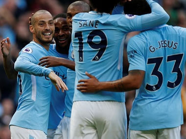 Manchester City's David Silva celebrates scoring team's third goal with teammates . Reuters