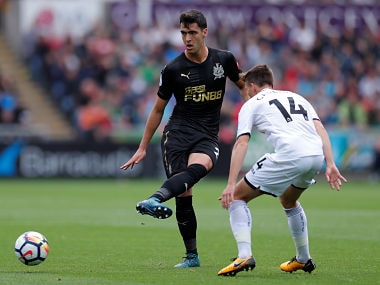 Newcastle Uniteds Mikel Merino in action with Swansea City's Tom Carroll. Reuters