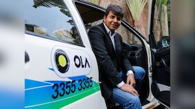 Ola raises $1.1 billion from investors lead by Tencent and SoftBank; seeks to raise another $1 billion